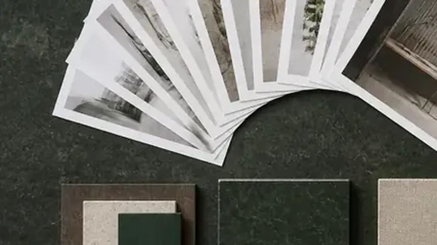 An organised overview of printed documents fanned out on a desk